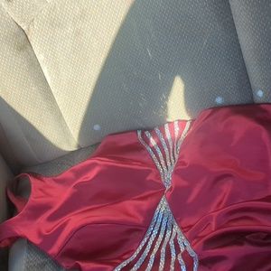 Reddish pink prom dress, it's a size 0, and the brand is bling prom.